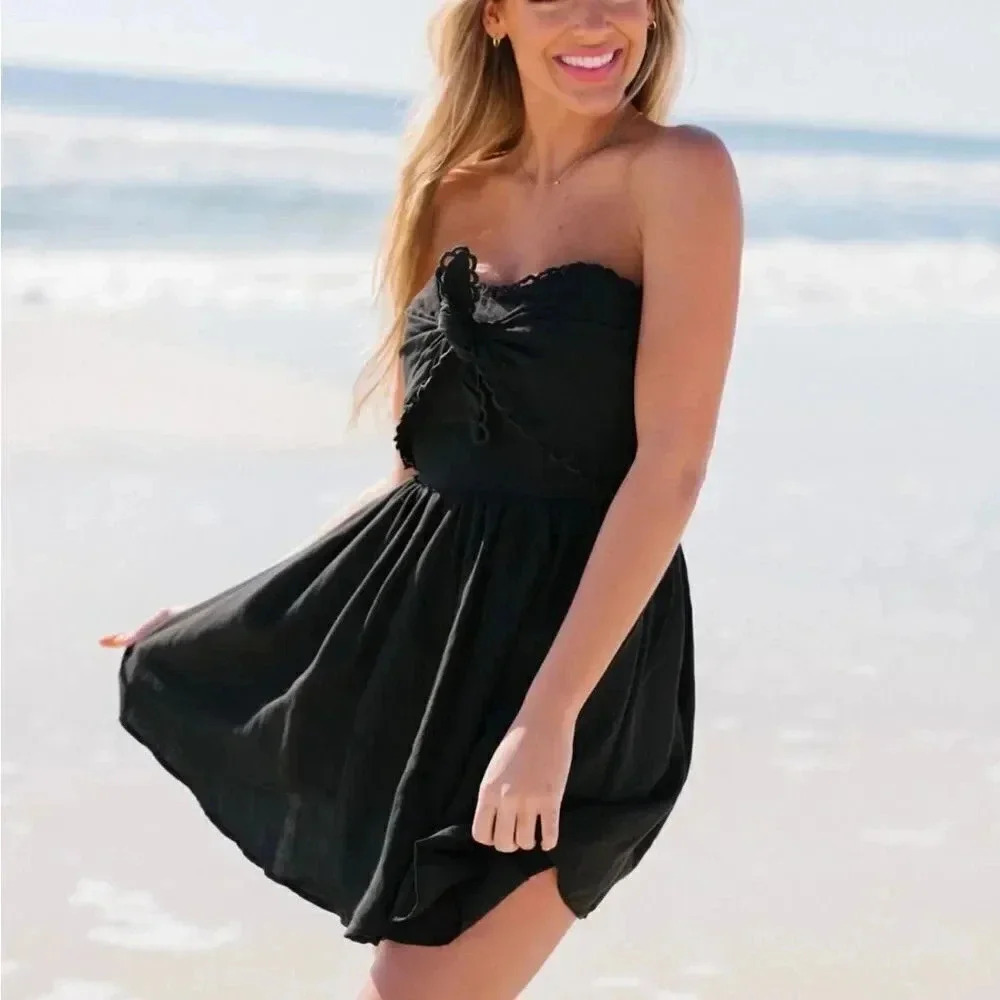 JUDITH MARCH TIE FRONT STRAPLESS A LINE PLEATED ZIP UP MINI DRESS IN BLSCK  M